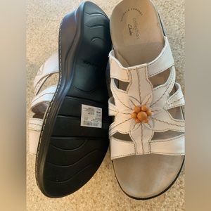 Clark’s white sandals. Size 11. Never worn